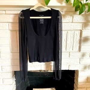 Free People. Long sleeve. Black shirt. Sheer sleeves. M/L. NWT.